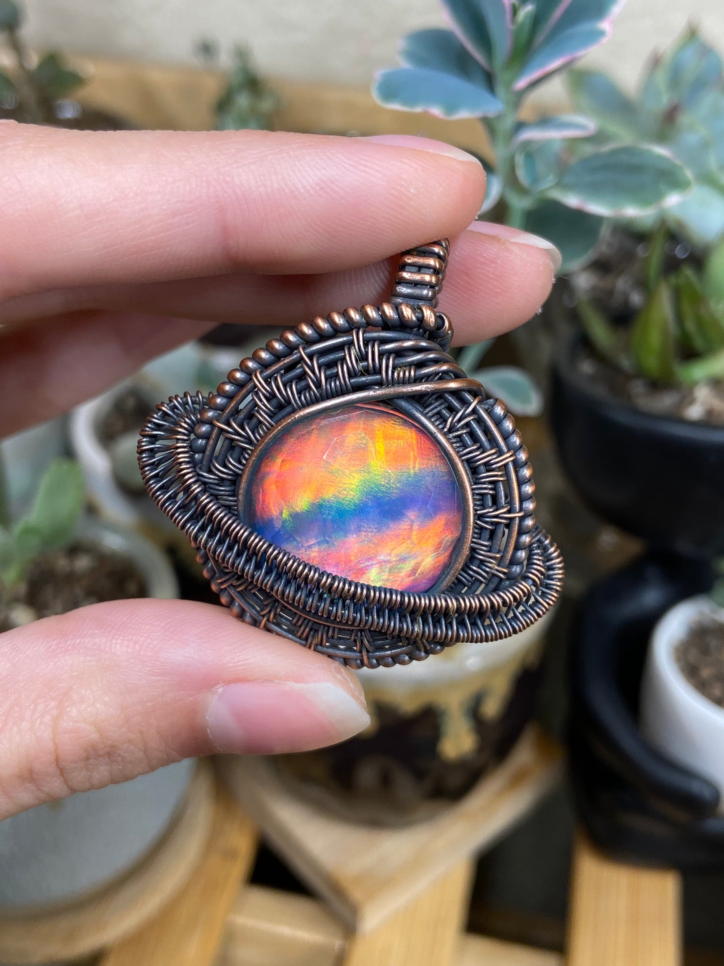 Aurora Opal Saturn amulet