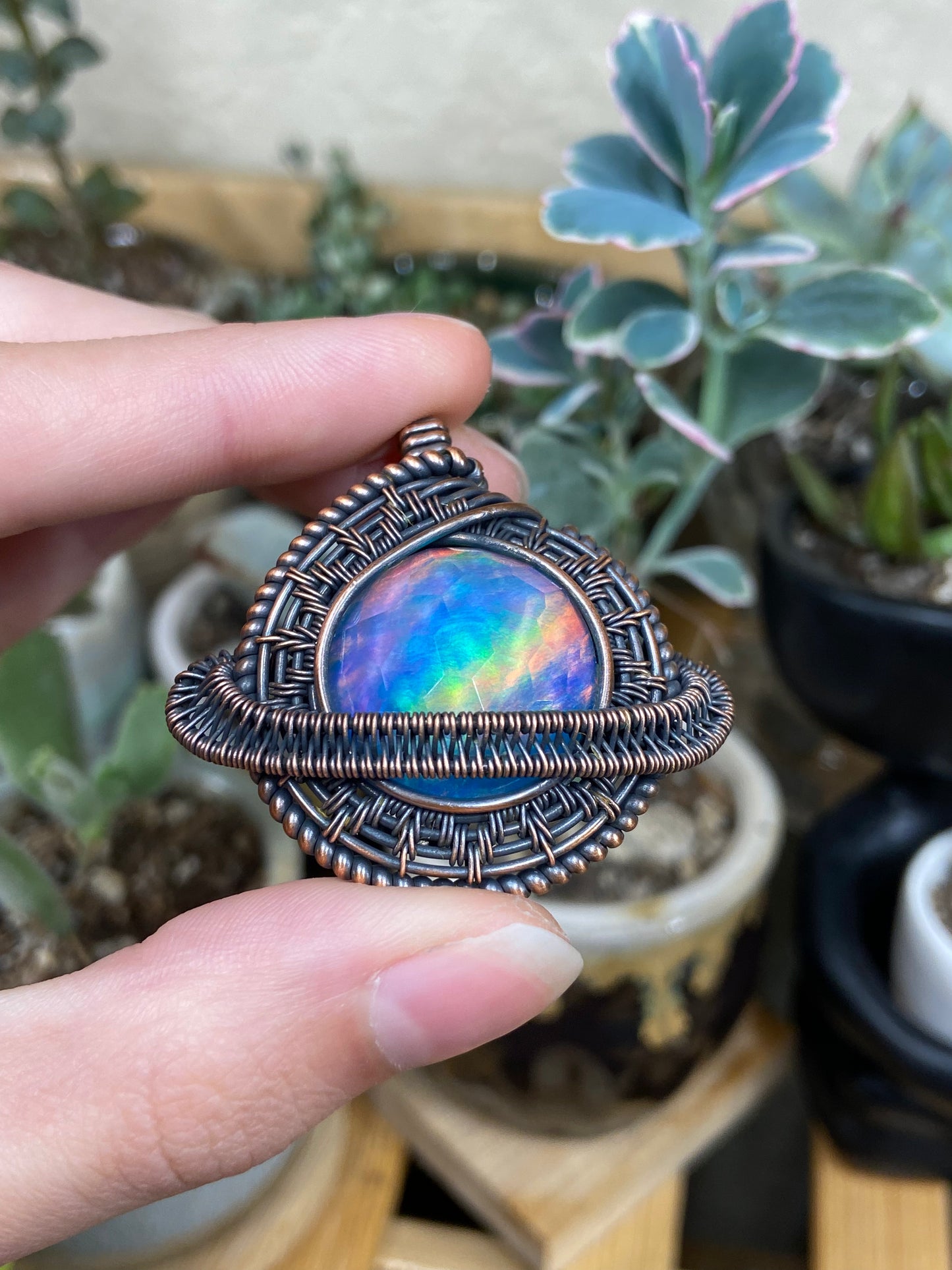 Aurora Opal Saturn amulet