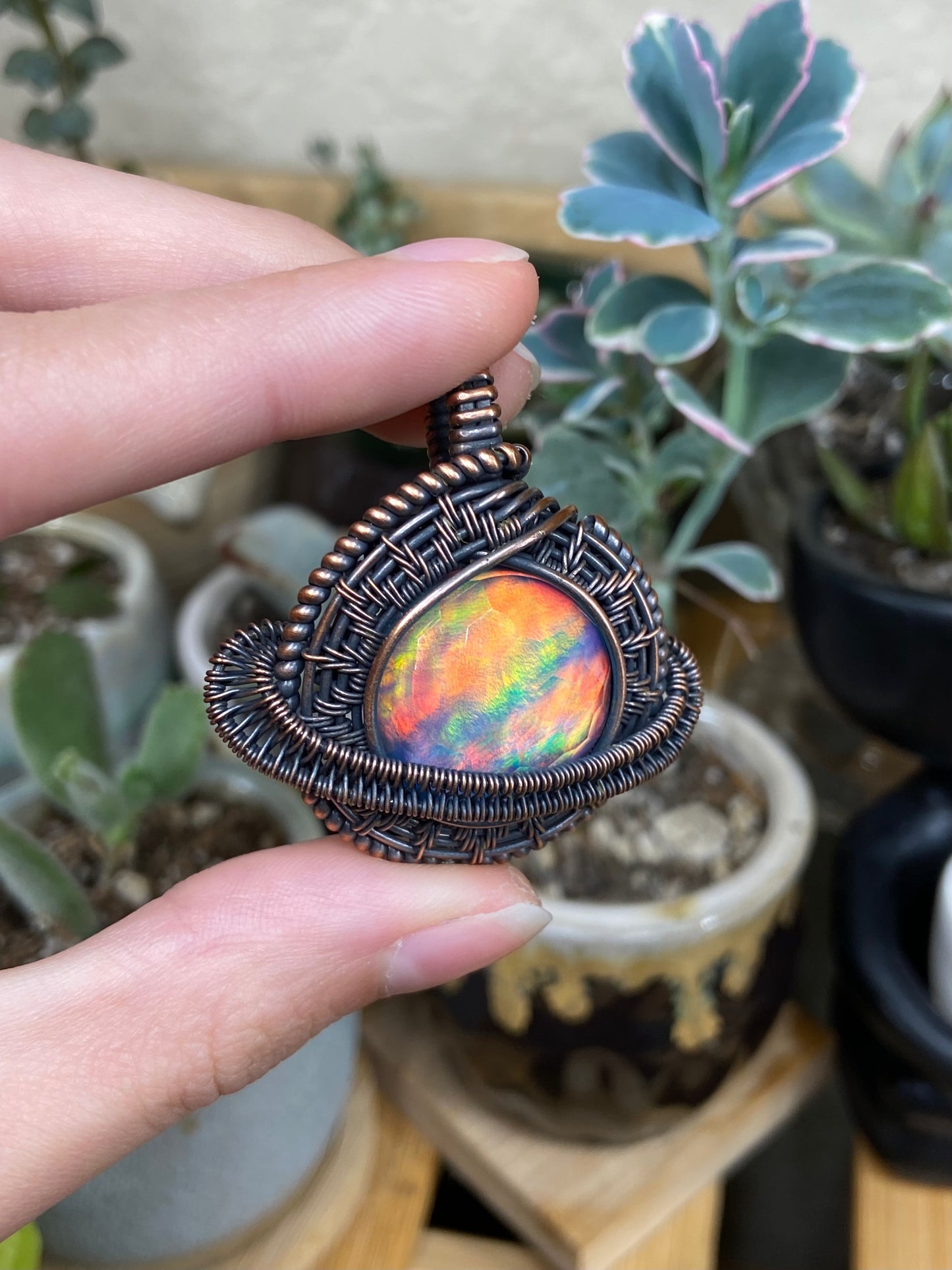 Aurora Opal Saturn amulet