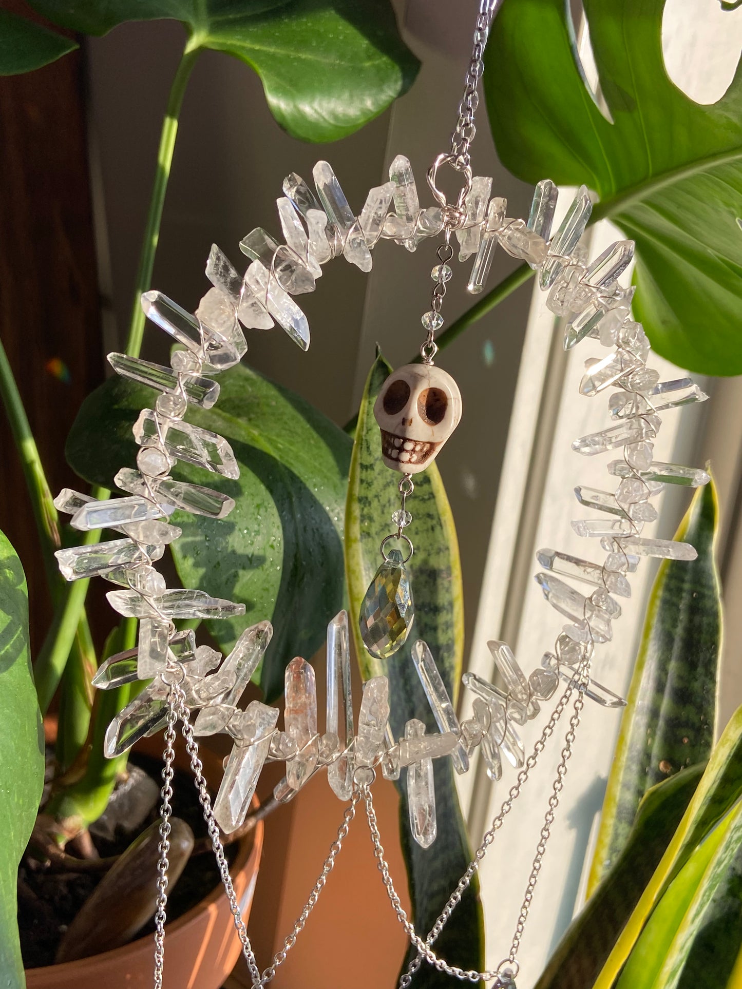 Clear Quartz and Howlite skeleton suncatcher