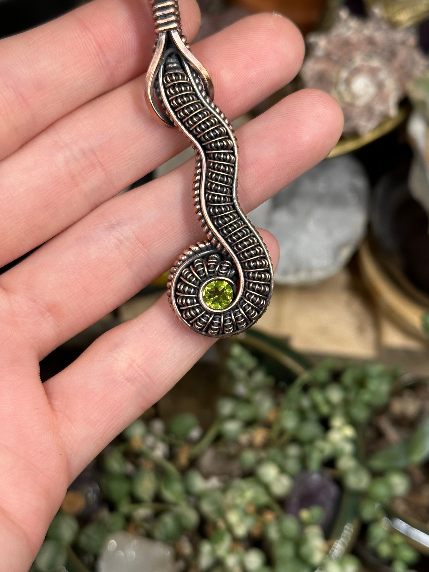 Peridot snake amulet