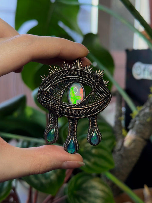 Drippy Opal Eye Amulet