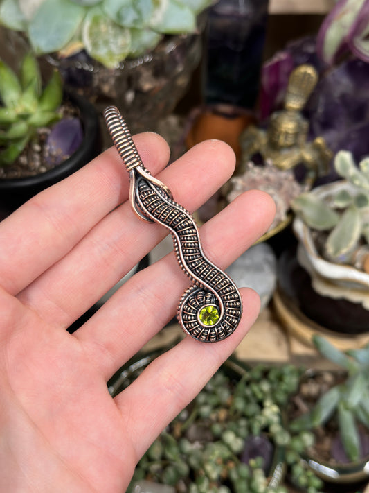 Peridot snake amulet
